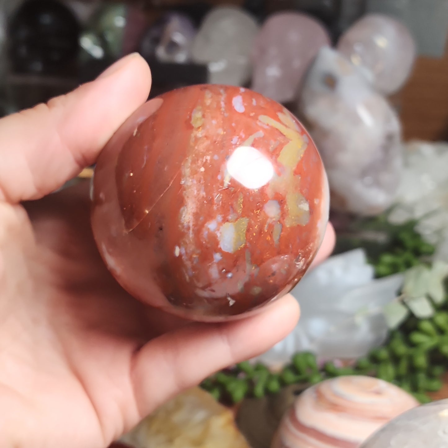 Red jasper sphere with quartz