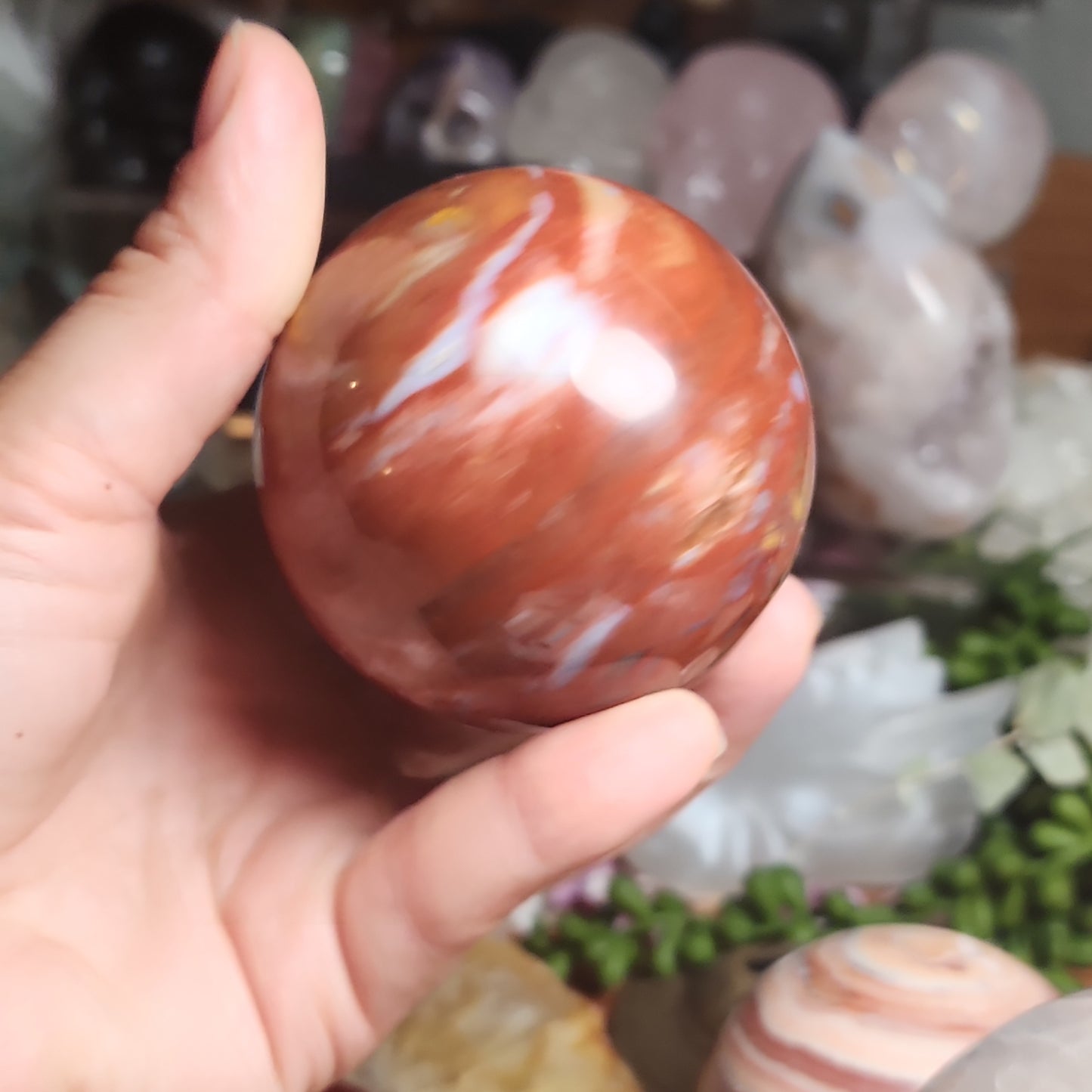 Red jasper sphere with quartz