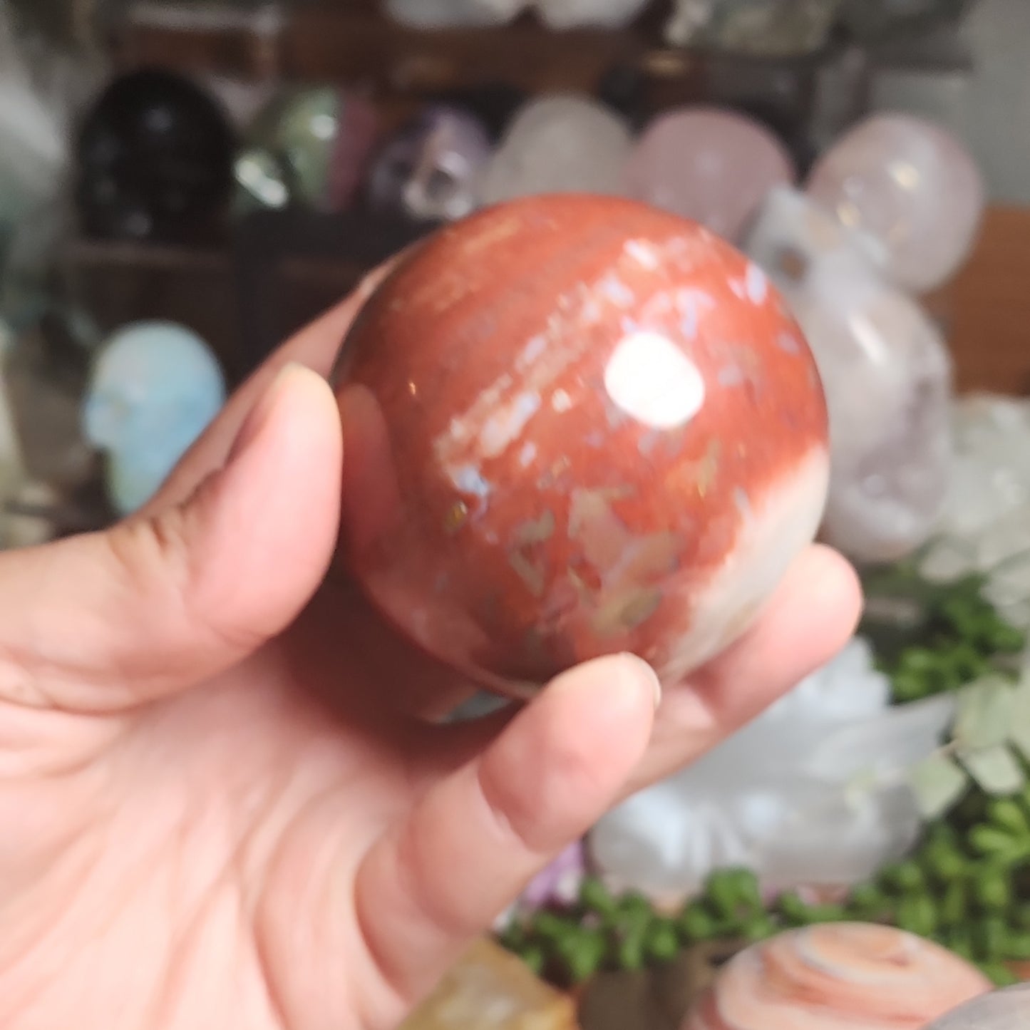 Red jasper sphere with quartz