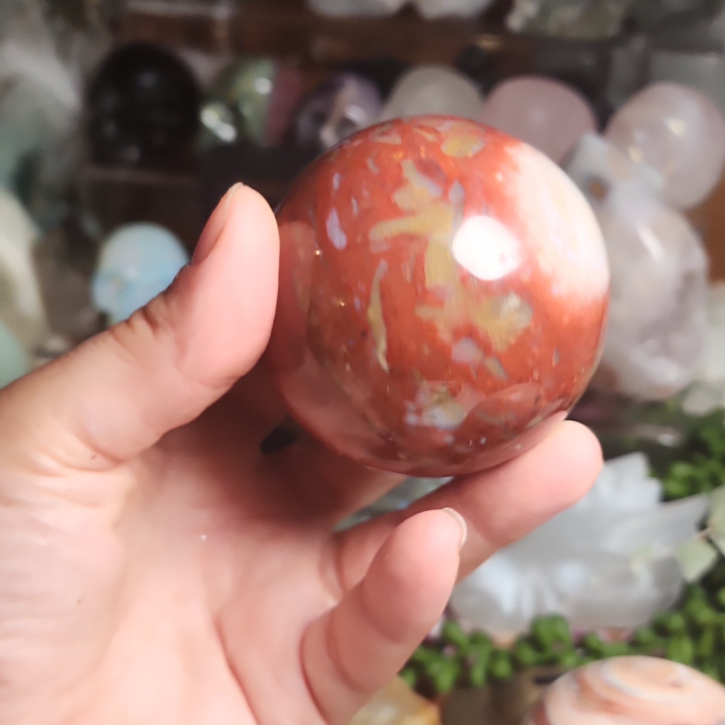 Red jasper sphere with quartz