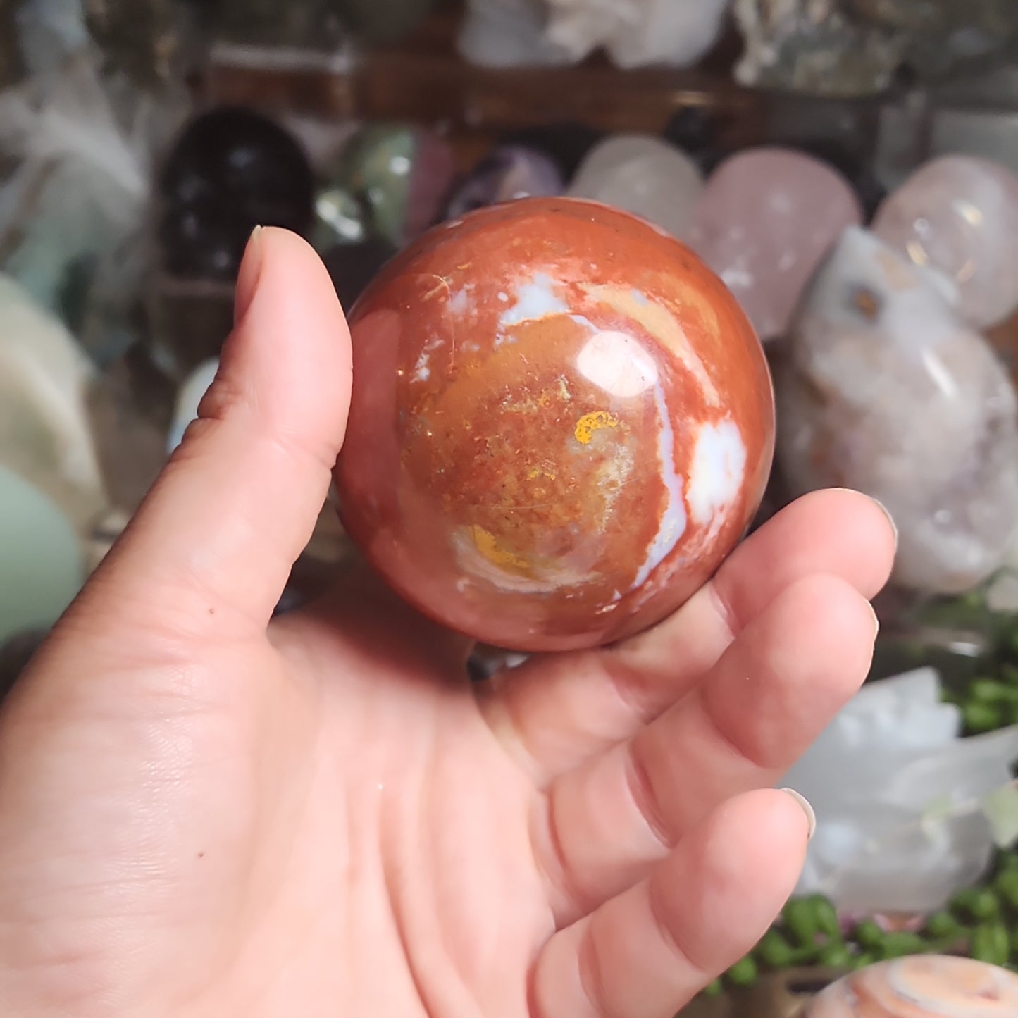 Red jasper sphere with quartz