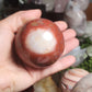Red jasper sphere with quartz