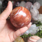 Red jasper sphere with quartz
