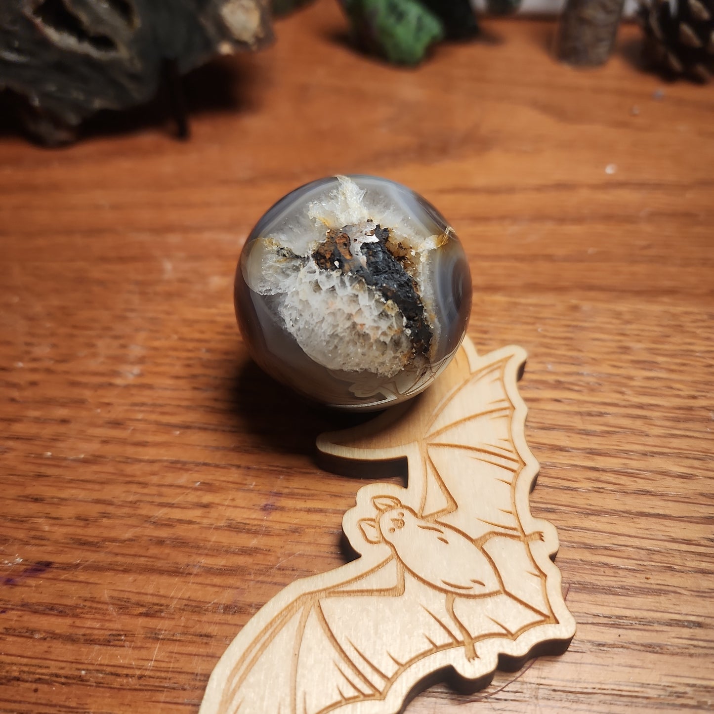 Banded druzy black flower agate sphere