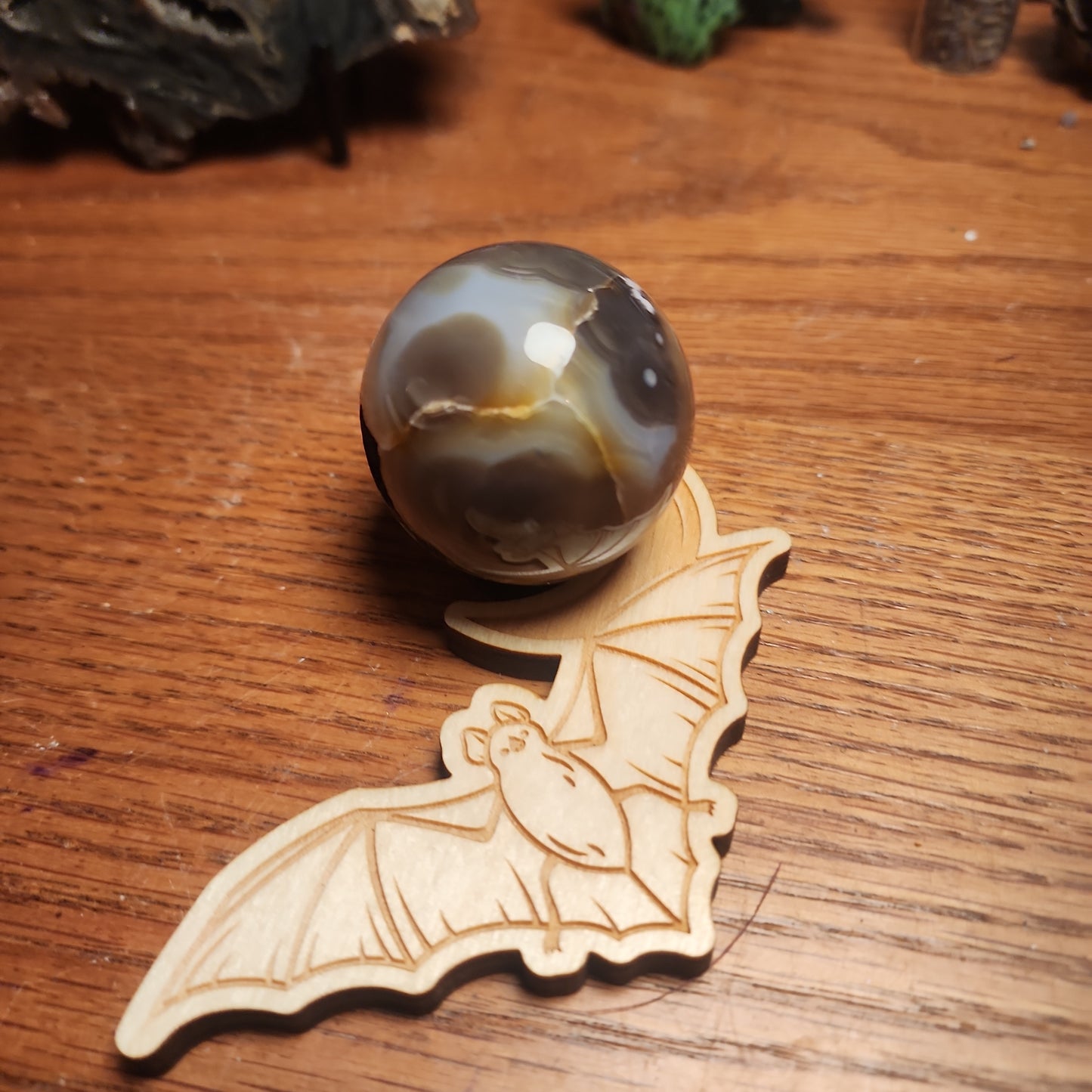 Banded druzy black flower agate sphere