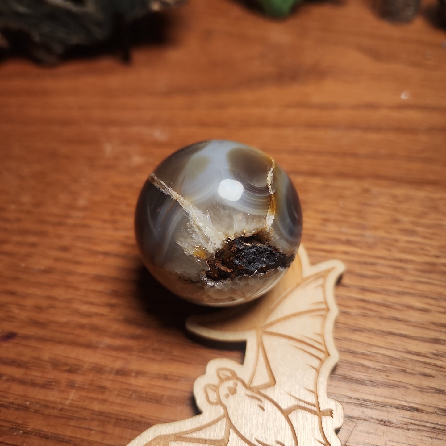 Banded druzy black flower agate sphere