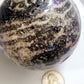 Large druzy ocean jasper sphere
