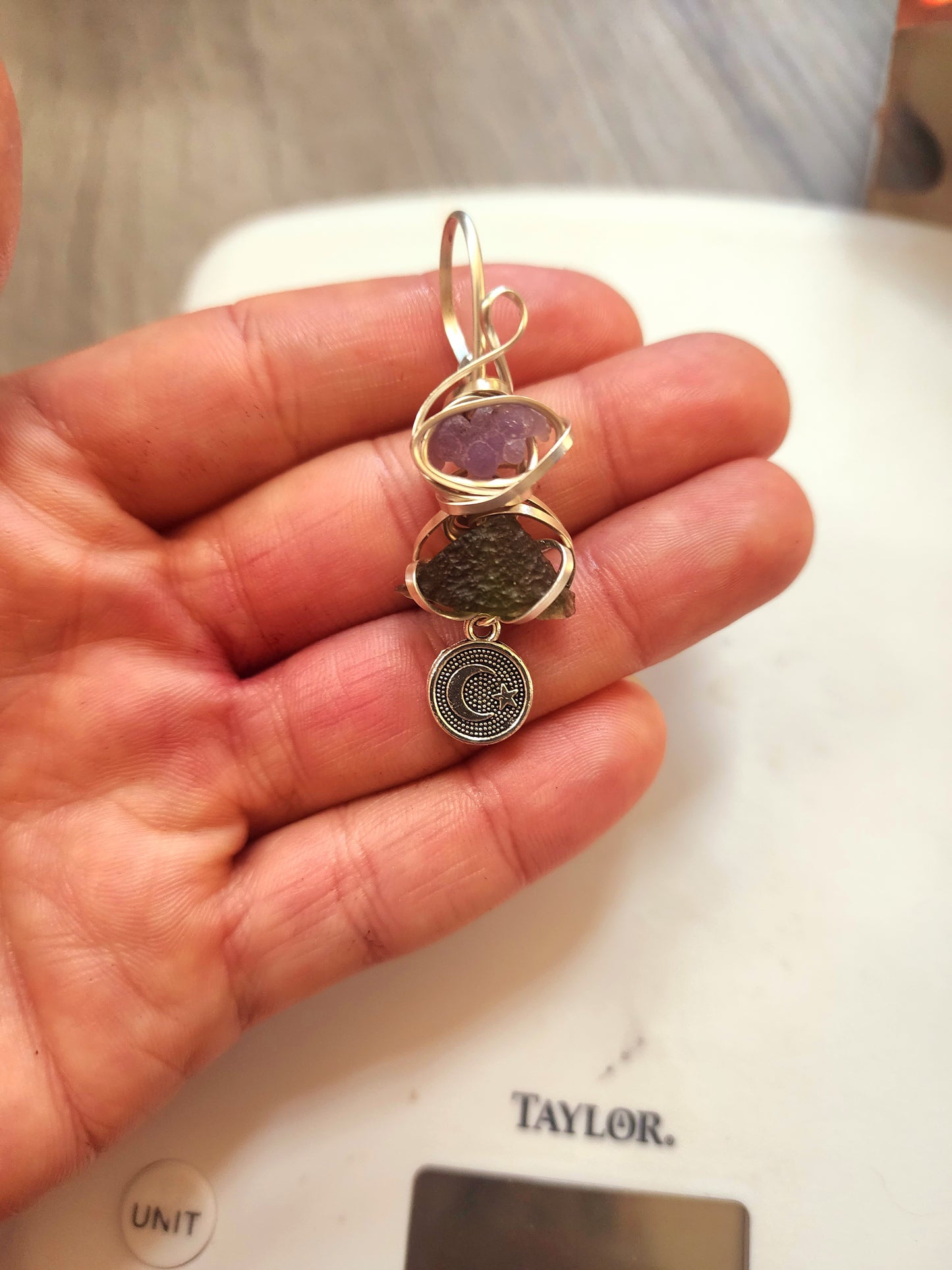 Moldavite and grape agate pendant