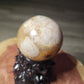 Druzy filled flower agate sphere