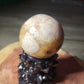 Druzy filled flower agate sphere