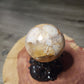 Druzy filled flower agate sphere