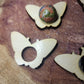 Butterfly sphere holder