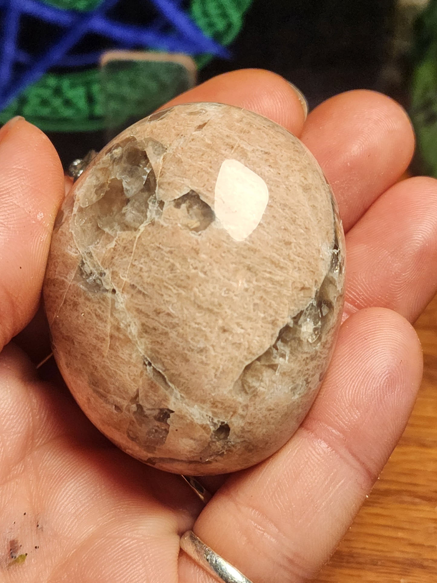 Flashy peach moonstone with smokey quartz palmstone